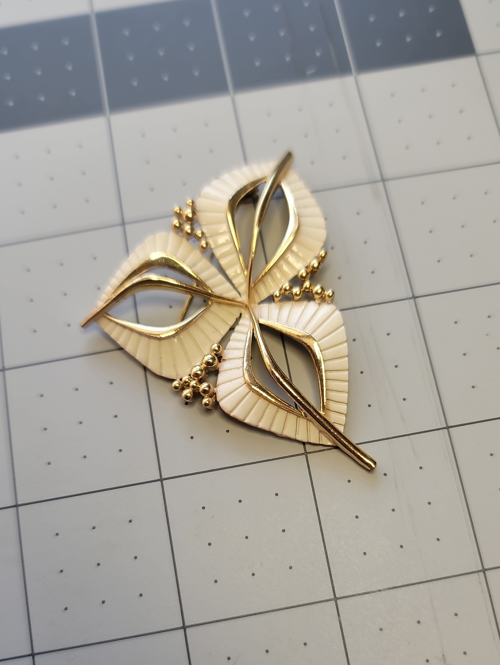Vintage Gold-Tone Brooch with Cream Enamel Leaf Accents